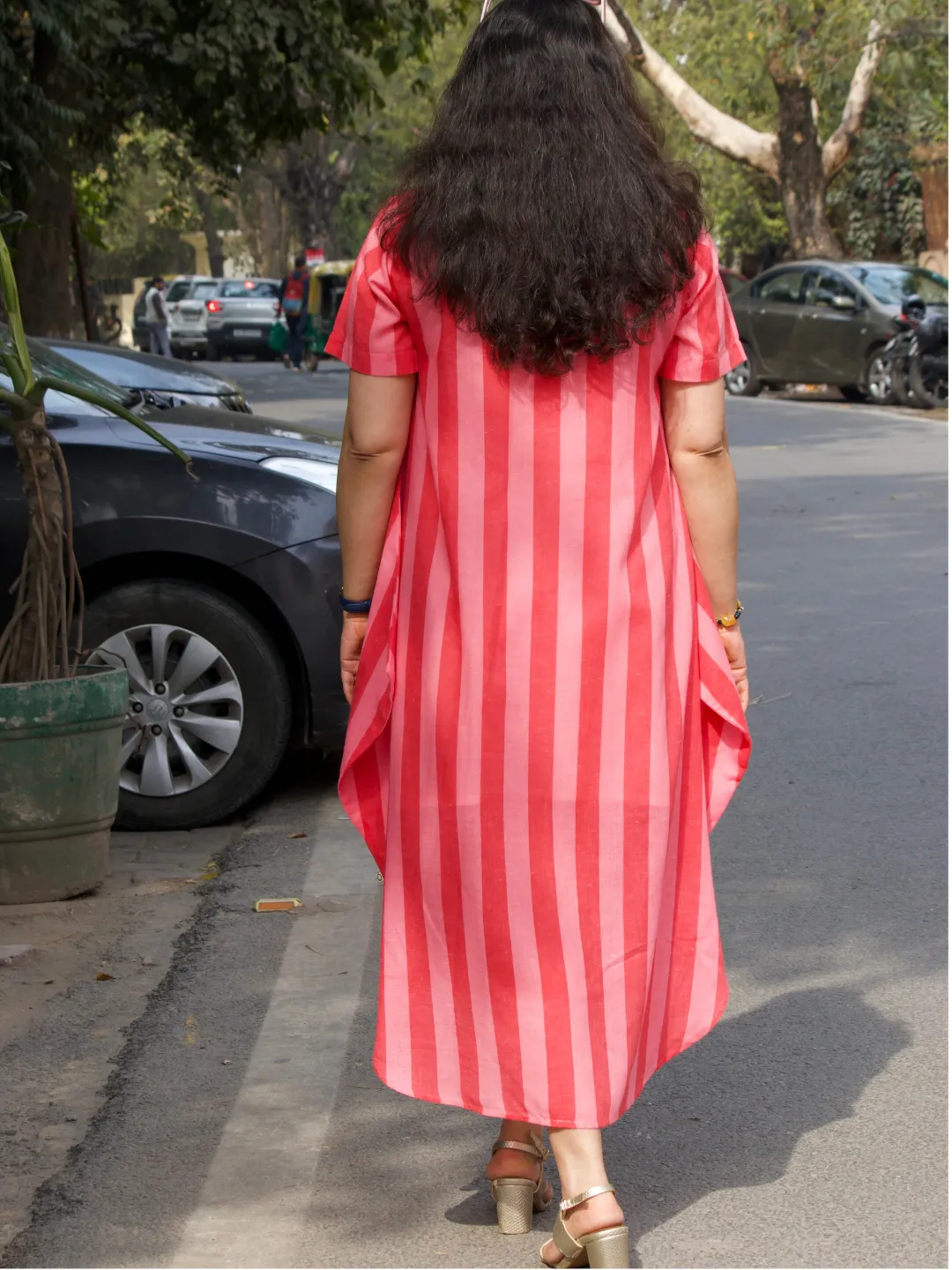 Asymmetrical dress in red and pink stripe cotton blend