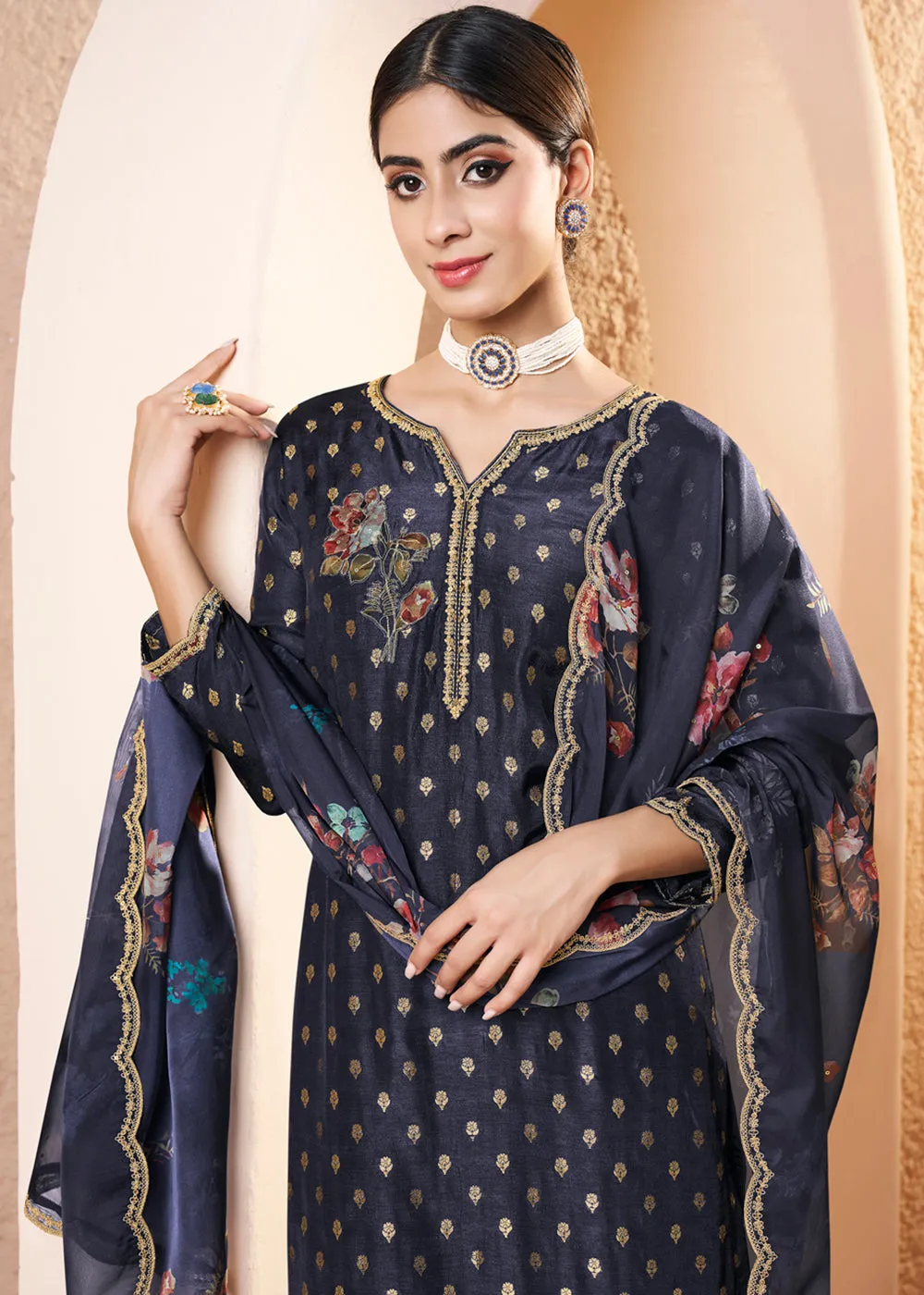 Blackish Blue Dola Silk Suit Adorned with Applique Patch and Sequin Work